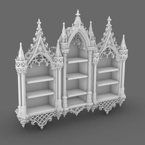 May include: A white, Gothic-style bookshelf with three sections. Each section has shelves for storage. The bookshelf features ornate architectural details, including pointed arches, spires, and decorative tracery. The overall design is reminiscent of a cathedral or church.