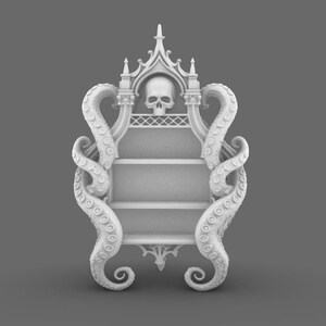 Puede incluir: Estanter&iacute;a blanca de estilo g&oacute;tico con una calavera en la parte superior y dos tent&aacute;culos a cada lado. La estanter&iacute;a tiene tres niveles y est&aacute; dise&ntilde;ada con detalles intrincados. El dise&ntilde;o general recuerda un tema de fantas&iacute;a u horror.