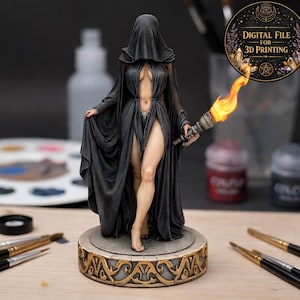 May include: A detailed figurine of a cloaked figure holding a torch with a flame. The figure is wearing a long black dress with a high slit. The base is round with a gold decorative border. The image includes the text "DIGITAL FILE FOR 3D PRINTING".