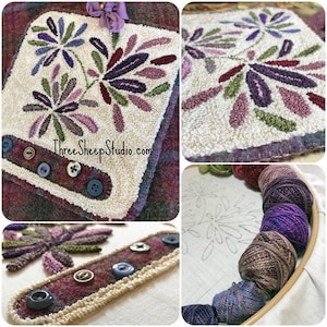 May include: A close-up of a needlepoint project with a floral design in shades of purple, green, and brown. The project is framed in a wooden hoop and surrounded by balls of yarn in various shades of purple, brown, and green. The text "ThreeSheepStudio.com" is visible in the bottom left corner of the image.