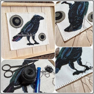 May include: A close-up of a black crow needlepoint project in progress. The crow is surrounded by three circles of fabric, two of which are partially completed. The image also shows the tools used for needlepoint, including scissors, yarn, and a needle tool.