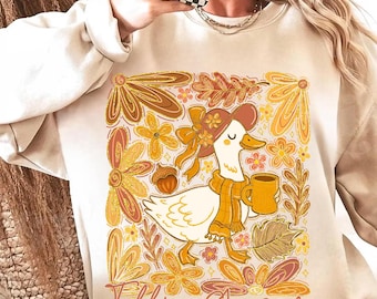 Ganso Fellin PNG, Lindo ganso otoñal con bufanda y sombrero de café, Clipart de flores de otoño, Diseño de sublimación de ganso acogedor para camiseta de otoño