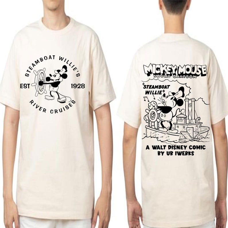 May include: A white t-shirt featuring a black and white illustration of Mickey Mouse on a steamboat. The text "STEAMBOAT WILLIE'S" is printed on the front of the shirt, and the text "MICKEY MOUSE SOUND CARTOON" is printed on the back of the shirt.