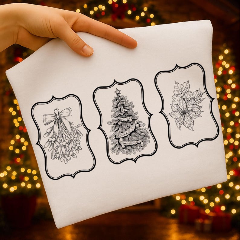 May include: A white pillowcase featuring three black and white illustrations within decorative frames. The illustrations include mistletoe with a bow, a Christmas tree with garland, and poinsettias. The pillowcase is held up by a hand.