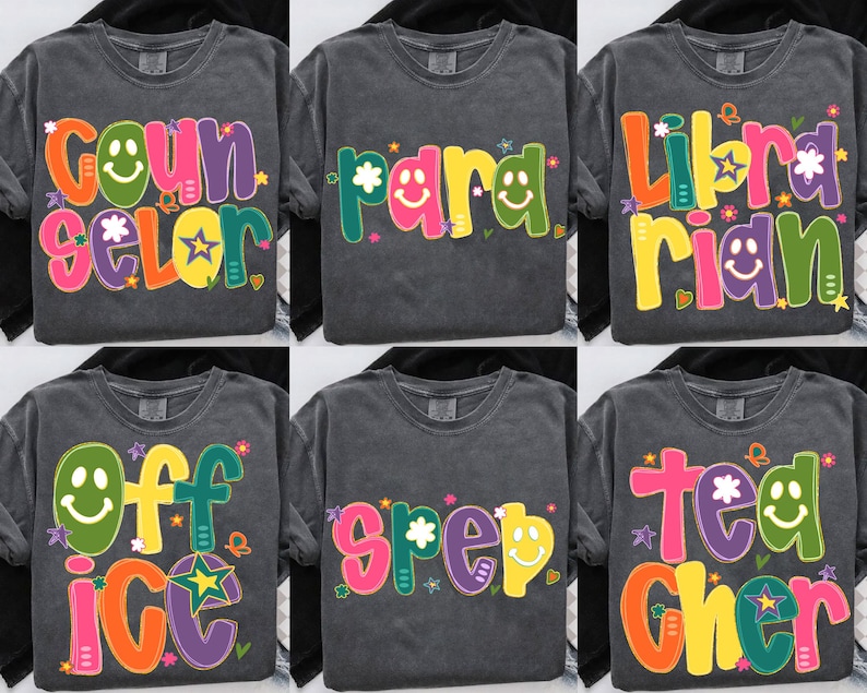 May include: Six dark gray t-shirts with colorful text designs. The shirts feature the words "Counselor", "Para", "Librarian", "Office", "Speech", and "Teacher" in playful fonts with smiley faces and floral accents.