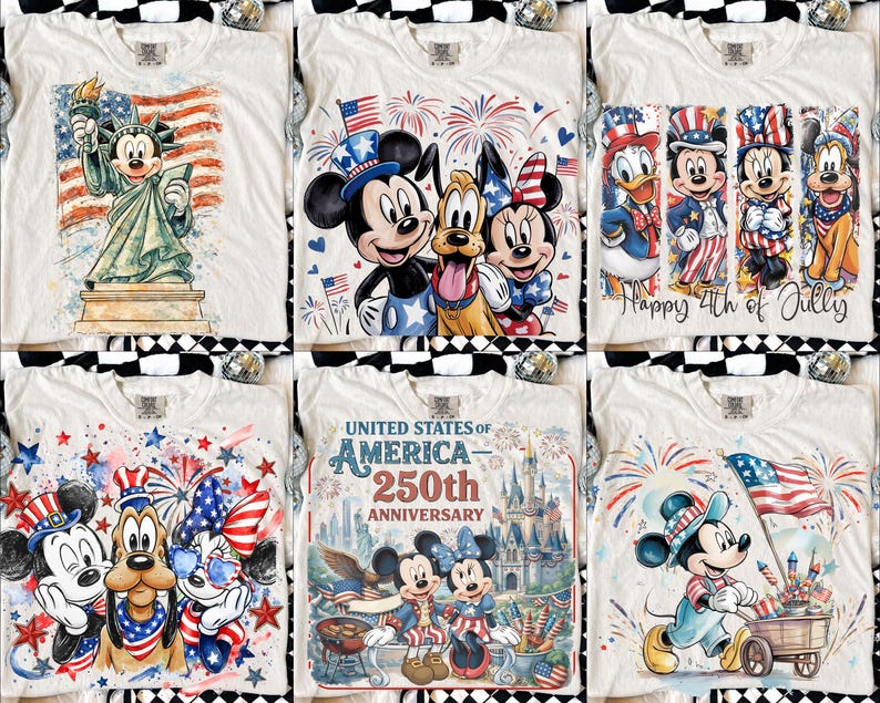 May include: Off-white t-shirts featuring patriotic designs with Disney characters. Designs include Mickey Mouse as the Statue of Liberty, Mickey, Minnie, and Pluto with fireworks, and a 250th Anniversary design. Each shirt has a unique graphic.