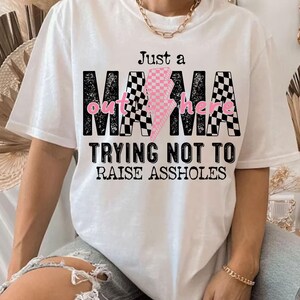 Just A Mama Out Here Trying Not To Raise Assholes Svg, Trendy Mom Svg, Sassy Mama Svg, Lightning Bolt Mama Svg, Mother's Day, Mom Quotes Svg image 3