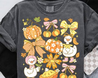 Ganso de otoño (PNG), adorable pato otoñal con calabazas, lazos, pastel y flores, clipart kawaii cottagecore, acogedor diseño de sublimación otoñal para camisetas