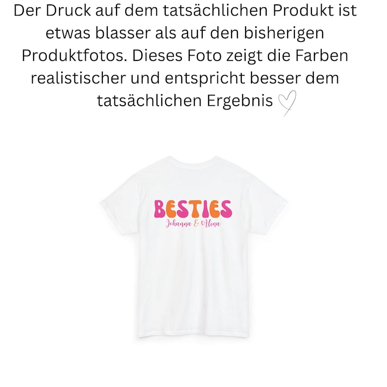 May include: White t-shirt with the word "BESTIES" in orange and pink retro font. Below the word "BESTIES" is the text "Johanna & Hina" in a cursive font. The shirt is a simple, casual style.