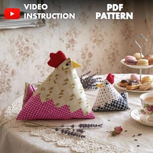 May include: A set of three ceramic mugs with a speckled, matte finish. The mugs are in shades of cream, light gray, and dark gray. Each mug has a simple, minimalist design, perfect for coffee or tea.