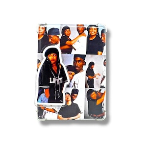 May include: A clear acrylic phone case featuring a collage of black and white images of people. The case has a rectangular shape with rounded corners. One image is a cutout of a person wearing a black jersey with the text "LA" on it.