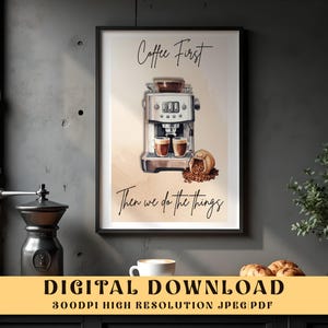 May include: Framed art print featuring a watercolor illustration of a coffee machine, coffee beans, and two cups of coffee. The text "Coffee First, Then we do the things" is displayed. The print is a digital download.