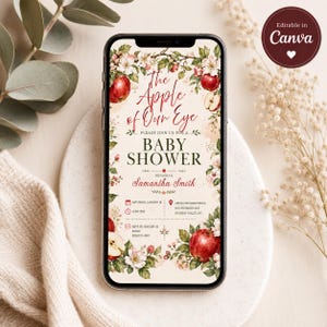 Puede incluir: Una invitaci&oacute;n digital para baby shower en la pantalla de un tel&eacute;fono inteligente con manzanas rojas, flores de manzano blancas y hojas verdes. El texto dice: The Apple of Our Eye, Baby Shower, en honor a Samantha Smith, 18 de enero, 4:00 PM.