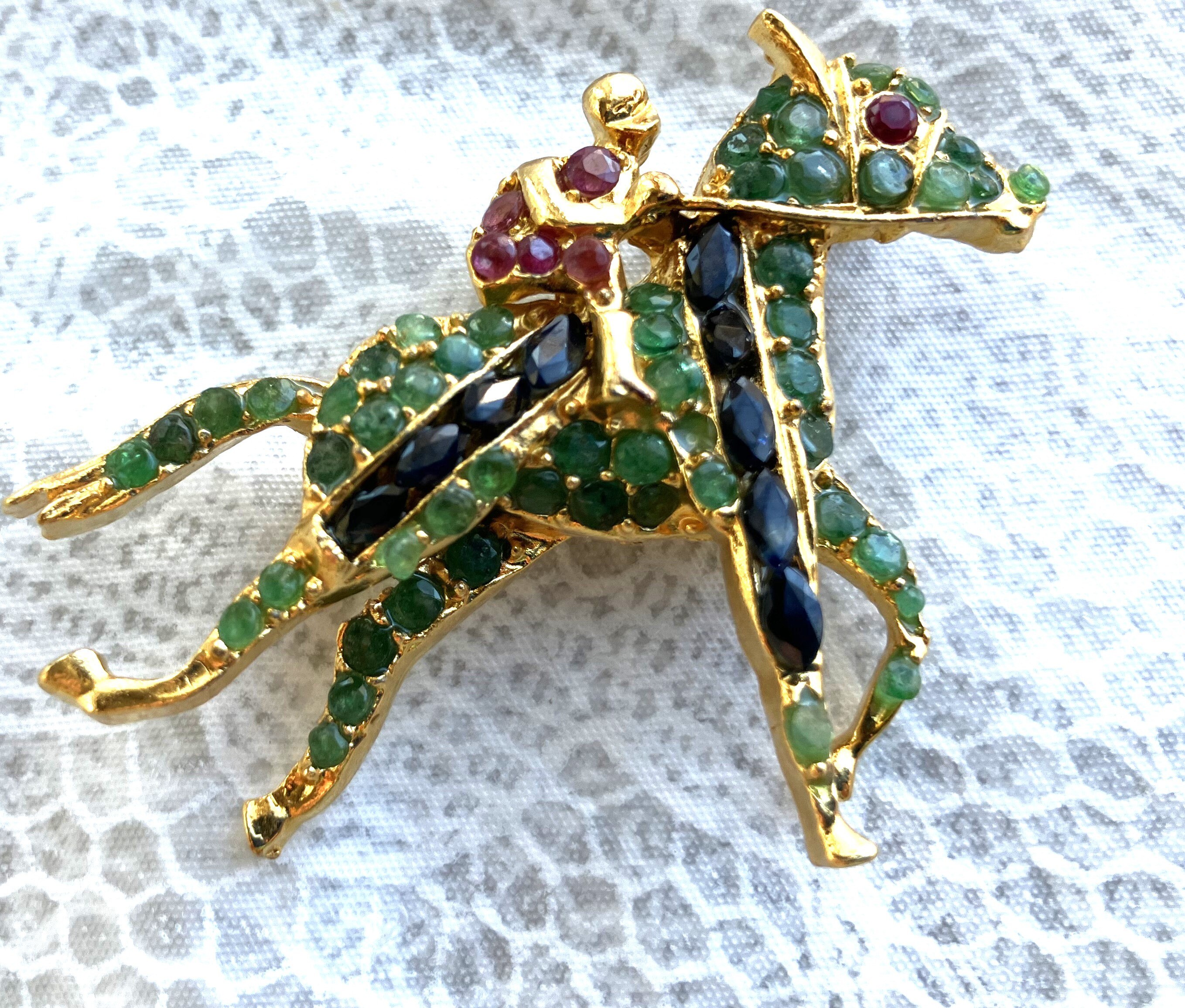 Swoboda horse brooch with Real gems ruby sapphire and emerald from the 60s