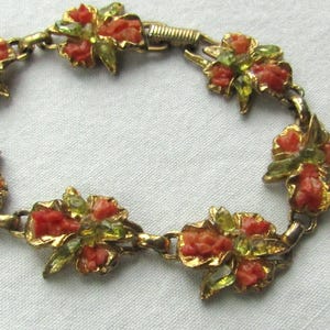 Vintage bracelet of green and orange stones