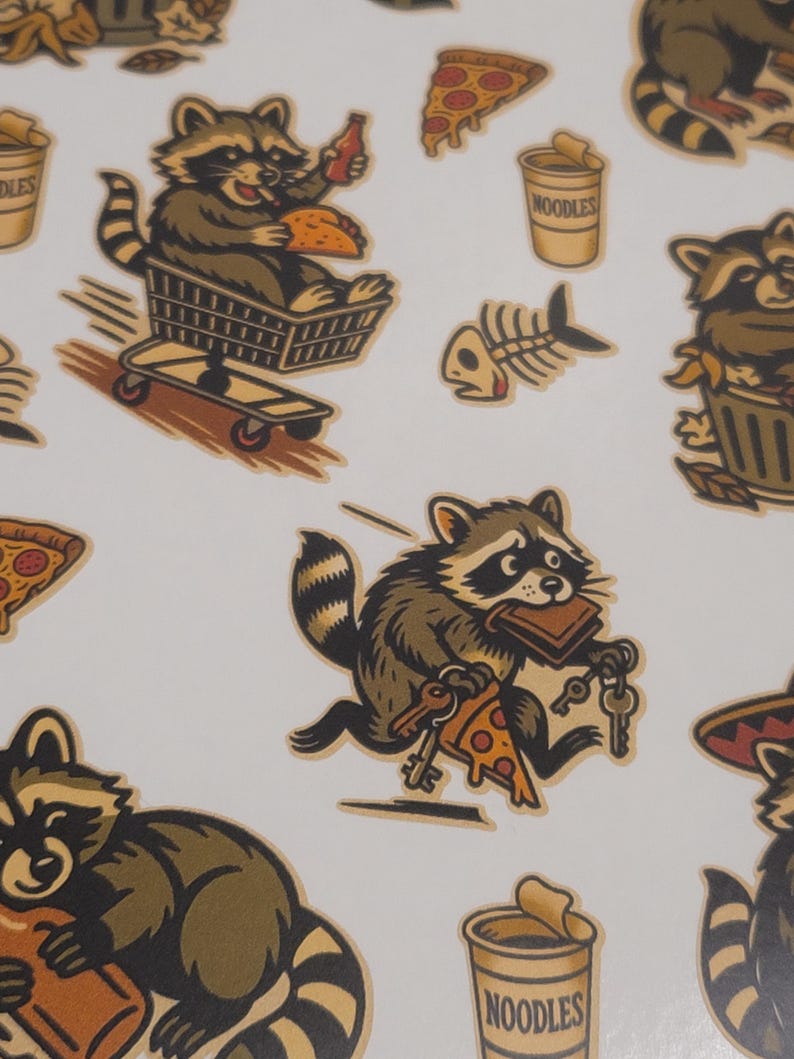 May include: A repeating pattern of cartoon raccoons in various poses. One raccoon is in a shopping cart on a skateboard, another is carrying keys and pizza, and others are near food items like pizza and noodles.