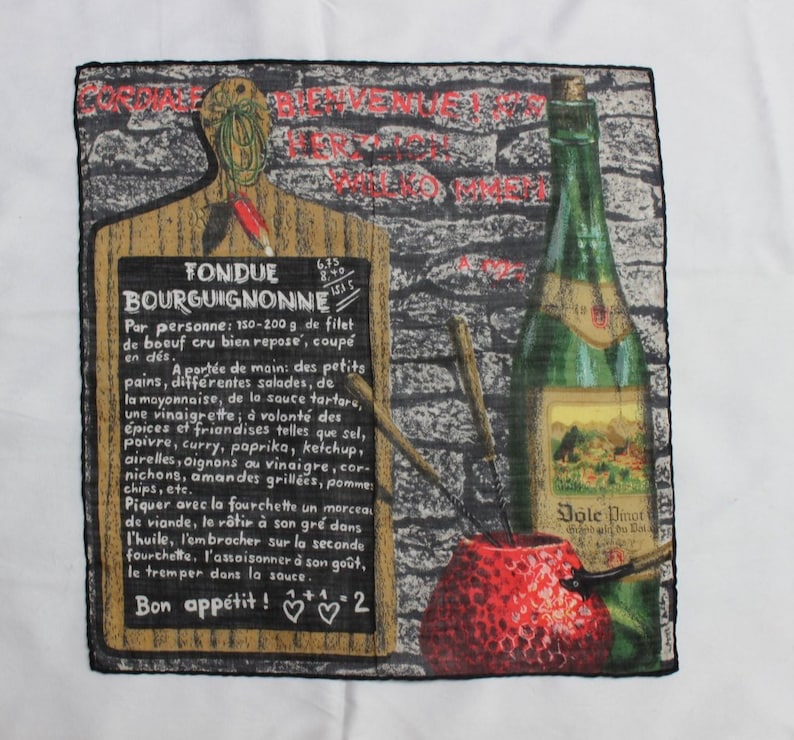 May include: A vintage-style illustration of a fondue recipe with a red apple, a bottle of wine, and a wooden cutting board with a chalkboard. The chalkboard has the text "Fondue Bourguignonne" and instructions for preparing the dish. The text reads "6.75 8.40 15.15".