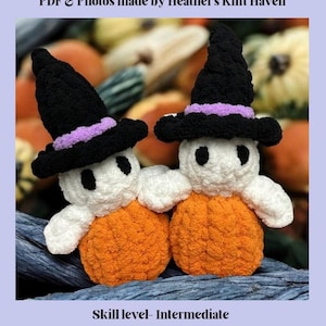 May include: A Halloween-themed image featuring two crocheted ghost figures. Each ghost has a white body, an orange pumpkin base, and wears a black witch hat with a purple band. The word "BOO!" is at the top.