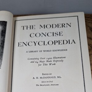 May include: The title page of a book titled The Modern Concise Encyclopedia: A Library of World Knowledge. It notes it contains over 1400 illustrations and 64 maps made expressly for this work, edited by A. H. McDannald, B.L., Editor-in-Chief.