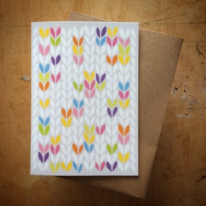 Grafica a maglia calza luminosa - biglietto di auguri
