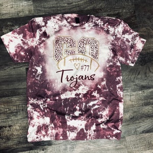 Maroon bleached football mom shirt.  Custom team name and personalized with players number