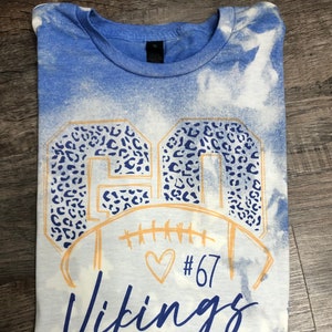 Football Mom custom blue bleached tee.  Personalized with players number and team name