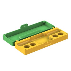 May include: A rectangular two-piece storage case featuring a bright green lid and a yellow base. The yellow base contains a central rectangular compartment and four circular indentations, while the green lid is hollow with a simple latch tab.