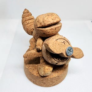 Flying Gecko – Handcrafted Cork Art Figure of a Gecko on a Airplane Taking Flight