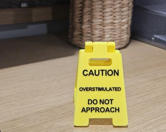 Caution Overstimulated Desk Sign