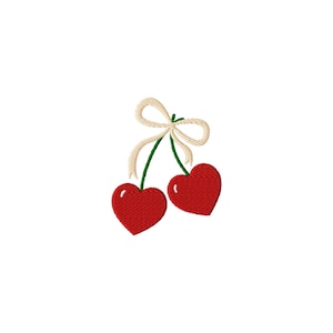 May include: Embroidered design of two red heart-shaped cherries with green stems and a cream-colored bow. The cherries have a textured appearance, and the bow adds a delicate touch. The design is set against a plain white background.