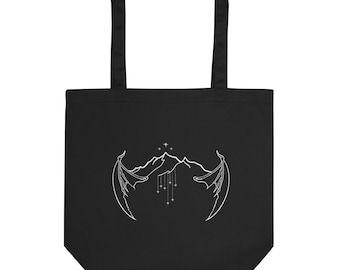 May include: Black tote bag with a white design of a mountain range with stars and wings.