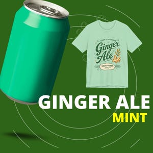 May include: A bright green aluminum beverage can positioned next to a light mint green t-shirt. The shirt features a graphic with the text "CRISP & REFRESHING Ginger Ale LIGHT-CLEAN-FIZZY" and an illustration of a ginger root. The words GINGER ALE MINT appear.