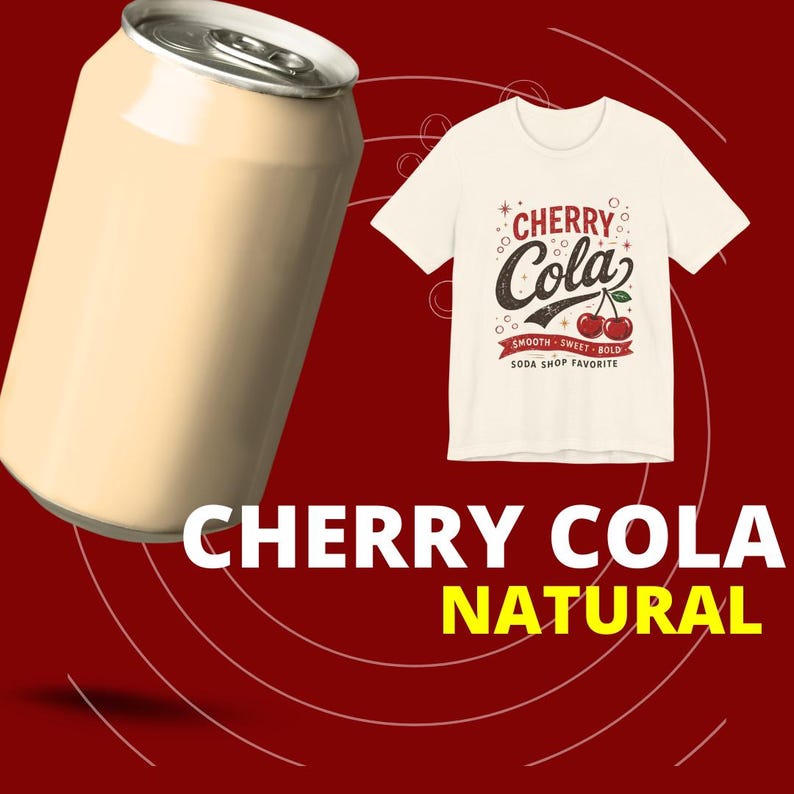 May include: A cream-colored t-shirt featuring a graphic of two red cherries and the text CHERRY COLA, SMOOTH, SWEET, BOLD, SODA SHOP FAVORITE, positioned next to a plain cream-colored aluminum soda can against a dark red background with white circles.