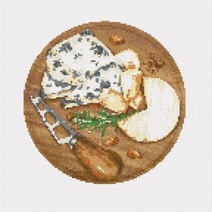 May include: A round wooden cheese board with a blue cheese wedge, a white cheese wedge, a sprig of rosemary, and a cheese knife.