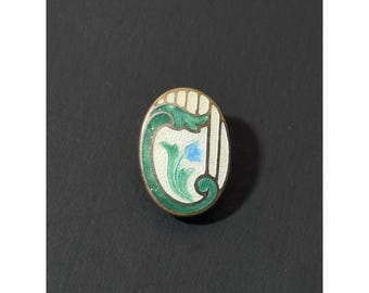 Fermaglio vintage in metallo ovale smaltato con motivo floreale