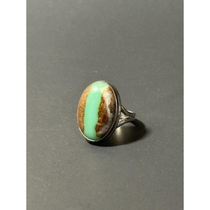 May include: A set of three ceramic mugs with a speckled, matte finish. The mugs are in shades of cream, light gray, and dark gray. Each mug has a simple, minimalist design and a rounded handle.