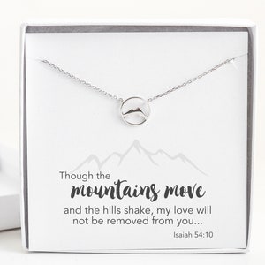 May include: A silver necklace with a mountain charm and a white box with the text "Though the mountains move and the hills shake, my love will not be removed from you... Isaiah 54:10"