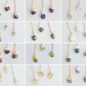 May include: A collection of 10 different raw gemstone necklaces. Each necklace features a unique raw gemstone pendant, including amethyst, aquamarine, emerald, garnet, citrine, rose quartz, sapphire, and topaz. The necklaces are available in gold, silver, and rose gold.