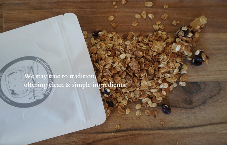 May include: A white resealable bag with the text "Pendleton Molasses We stay true to tradition, offering clean & simple ingredients."  The bag is open and spilling out granola with dried fruit and nuts.