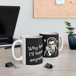 May include: White ceramic mug with a black design featuring a man smoking a cigarette and the text "Why bother, I'll have it anyway".