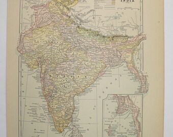 May include: A vintage map of India with detailed borders and rivers. The map is printed in shades of yellow, green, pink, and blue. The map includes a key with different colored lines representing different regions of India. The map is titled "INDIA" and includes a smaller map of "EASTERN PART OF INDIA" in the bottom right corner.