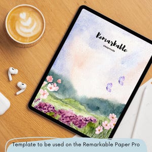 Puede incluir: Una plantilla digital para la tableta Remarkable Paper Pro con un paisaje de acuarela con flores moradas, colinas verdes y un cielo azul con mariposas. El texto "Remarkable sleepmode" está en la parte superior de la plantilla.