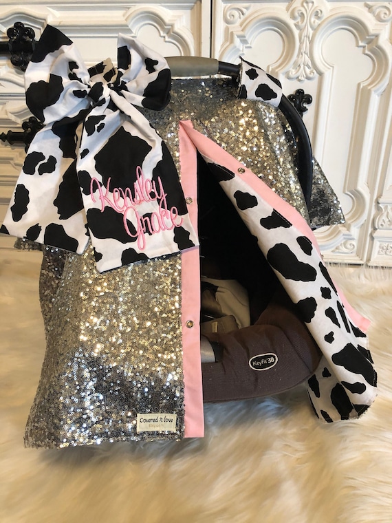 silver sparkle and cow print car seat canopy
