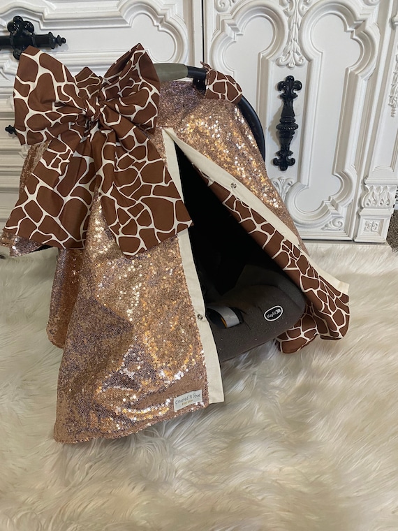 Rose gold and giraffe print car seat canopy