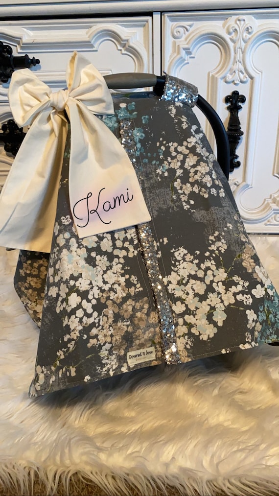 car seat canopy , blossoms