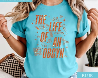 The Life Of A OBGYN Shirt, OBGYN T Shirt, OBGYN Appreciation Gift, Gynecologist T Shirt, Gynecologist Gift, Gynecologist Shirt Gift, RI779