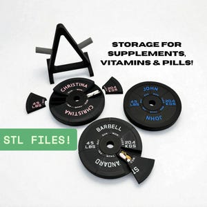 May include: Black weight plate-shaped pill organizers with the text "CHRISTINA", "JOHN", and "BARBELL". Each organizer has compartments for daily pills and includes the text "STORAGE FOR SUPPLEMENTS, VITAMINS & PILLS!" and "STL FILES!"