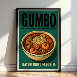 May include: A framed wall art print featuring a dark green background with the text GUMBO, NEW ORLEANS, BATON ROUGE, LAFAYETTE, MOBILE, and BAYOU BOWL FAVORITE. The center shows a bowl of gumbo with shrimp, sausage, and rice.