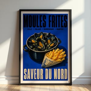 May include: Framed vintage poster with a blue background. The poster features the words "MOULES FRITES" and "SAVEUR DU NORD" in bold text. It depicts a pot of mussels and a cone of french fries. The poster is in a black frame.