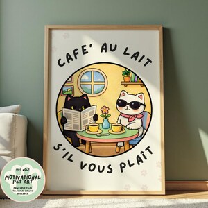 May include: A framed print featuring a whimsical illustration of two cats at a cafe. One cat reads a newspaper, while the other wears sunglasses. The text "CAFE AU LAIT S'IL VOUS PLAIT" is displayed. The print is labeled "MOTIVATIONAL PET ART".